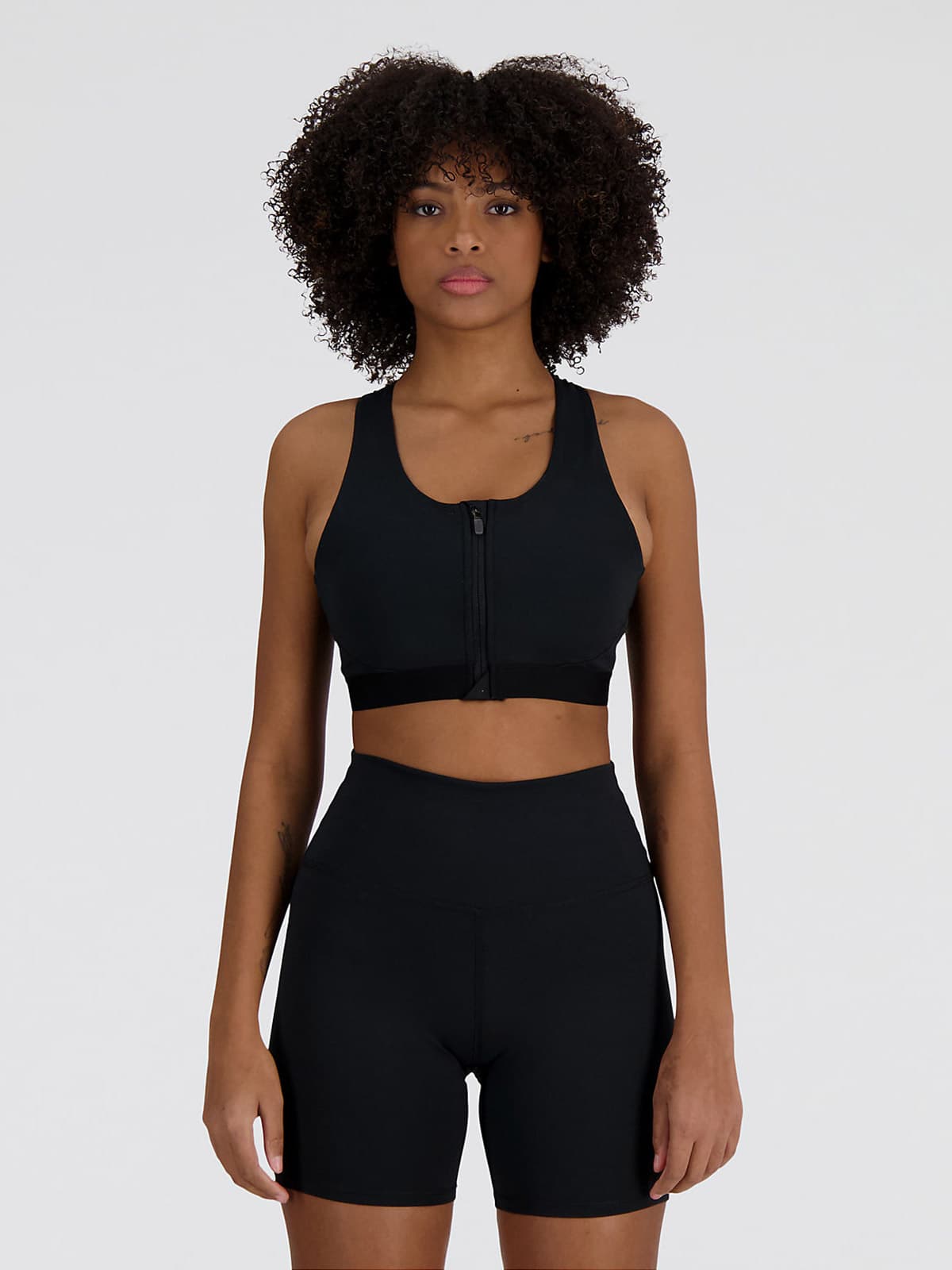 New Balance NB Sleek Medium Support Pocket Zip Front Bra Spor Sütyeni